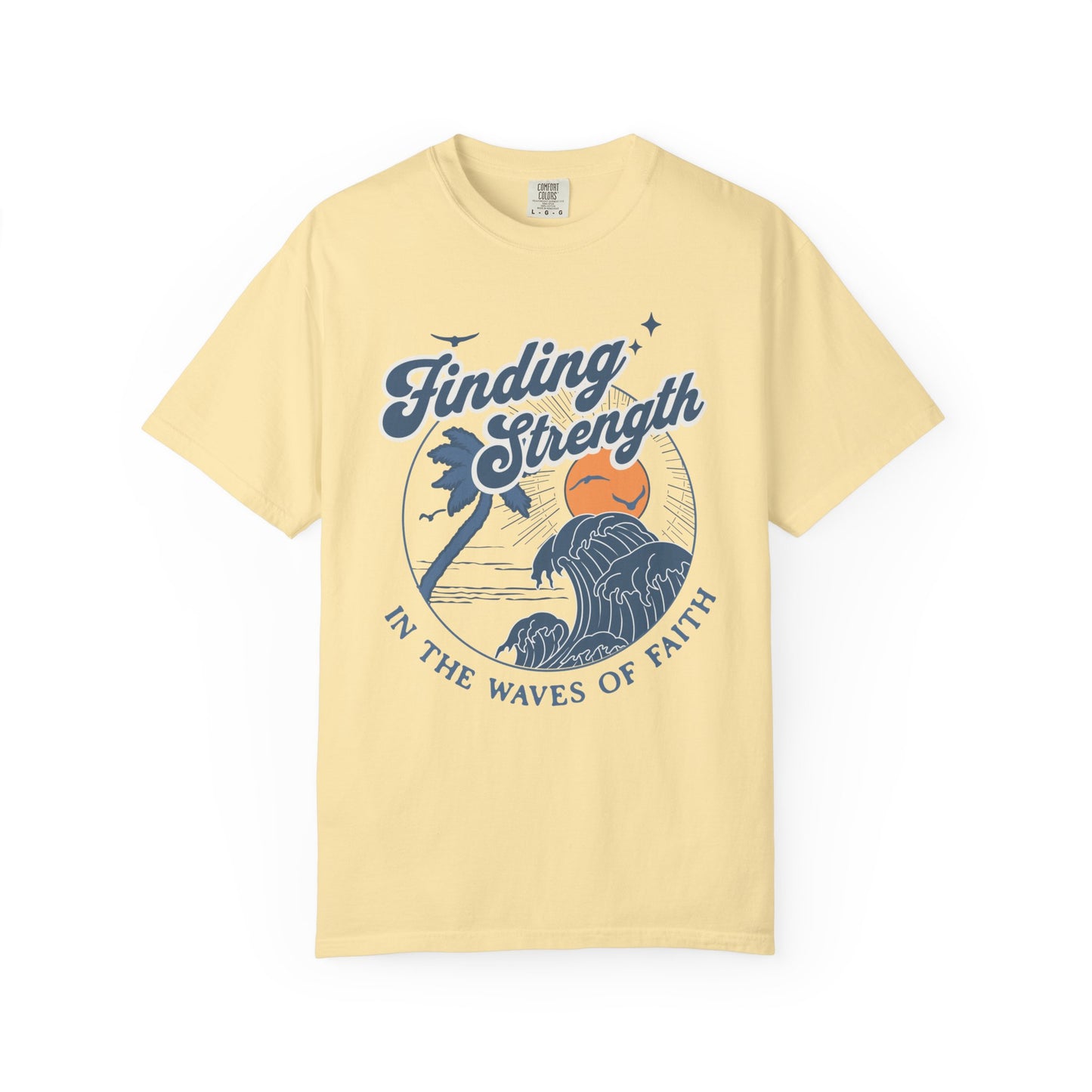 T-shirt with retro Christian design featuring palm tree, sunset, and ocean waves with Finding Strength text