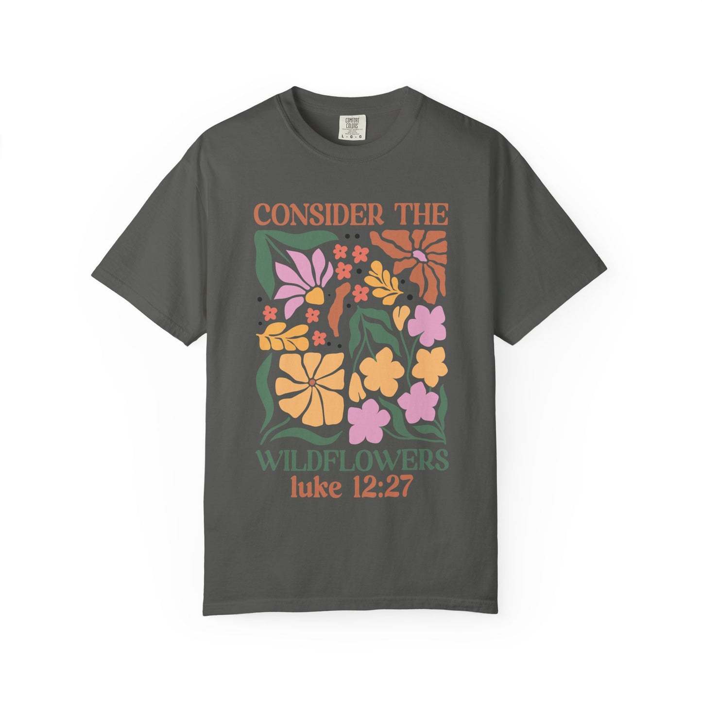 T-shirt with colorful wildflower design and 'Consider the Wildflowers Luke 12:27' bible verse text