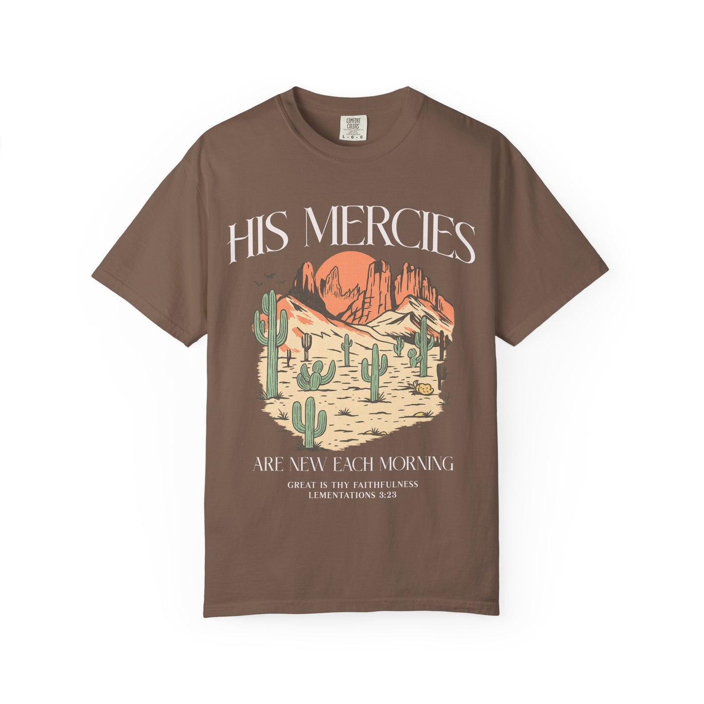 T-shirt with desert landscape design featuring cacti, mountains, and 'His Mercies Are New Each Morning' text with Lamentations 3:23 bible verse