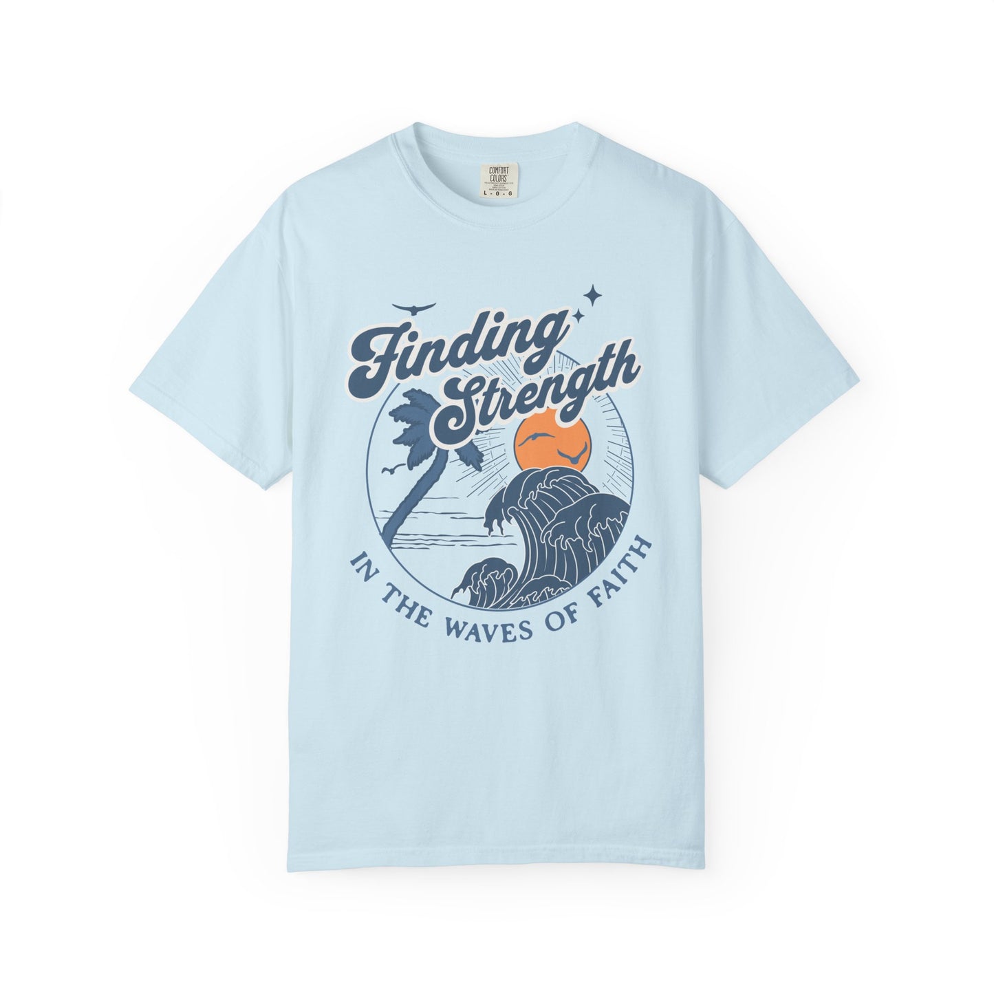 T-shirt with retro Christian design featuring palm tree, sunset, and ocean waves with Finding Strength text