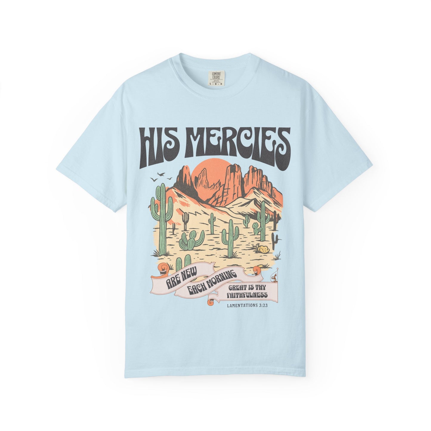 Christian t-shirt with desert landscape design featuring 'His Mercies Are New Each Morning' text and Lamentations 3:23 verse