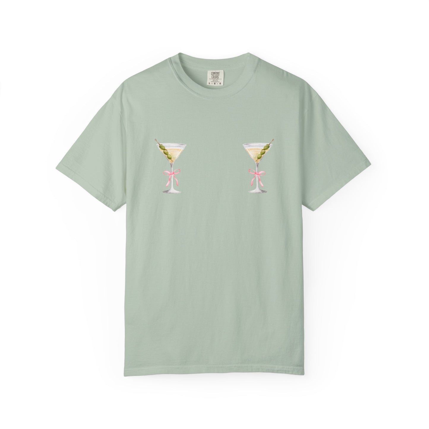 T-shirt design with two martini glasses containing olives and pink bow details creating a humorous cocktail theme
