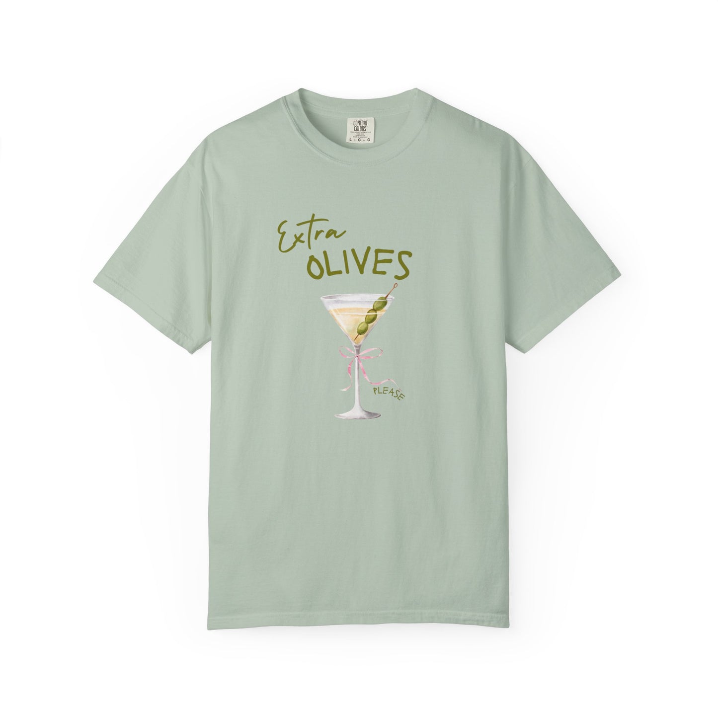 T-shirt design with martini glass, green olives, and pink bow saying Extra Olives Please