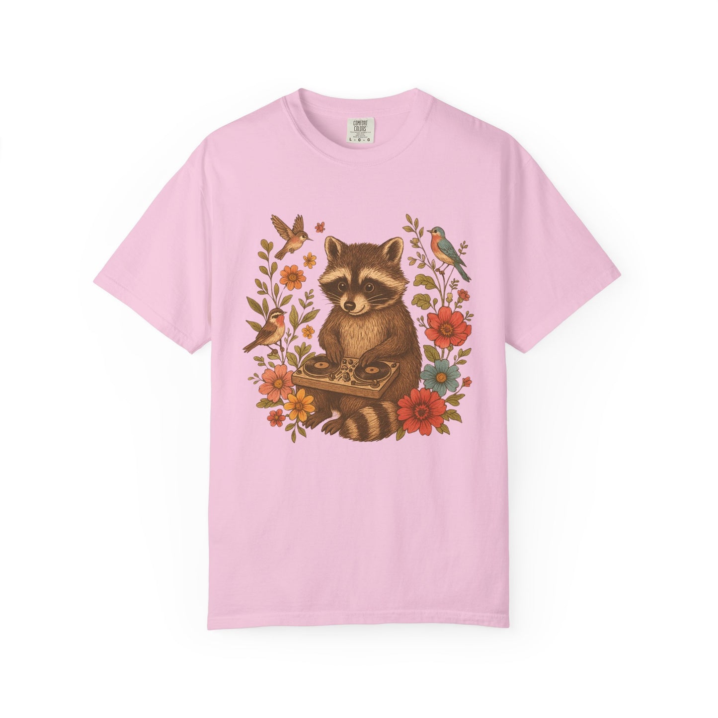 T-shirt with vintage raccoon DJ design surrounded by coral flowers, yellow blooms, and songbirds