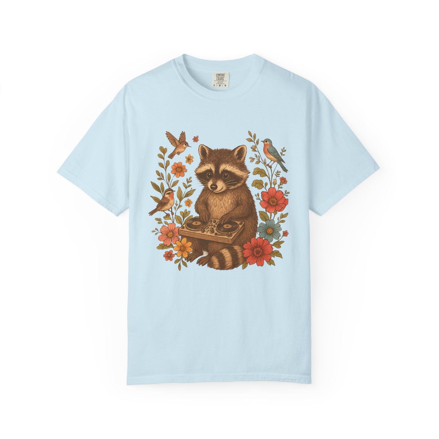 T-shirt with vintage raccoon DJ design surrounded by coral flowers, yellow blooms, and songbirds