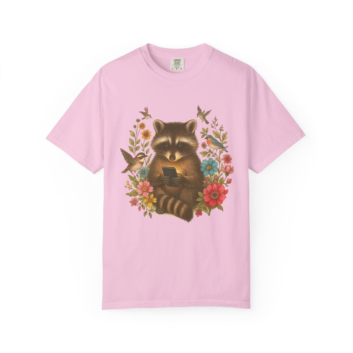 T-shirt design showing raccoon holding phone surrounded by colorful wildflowers and birds