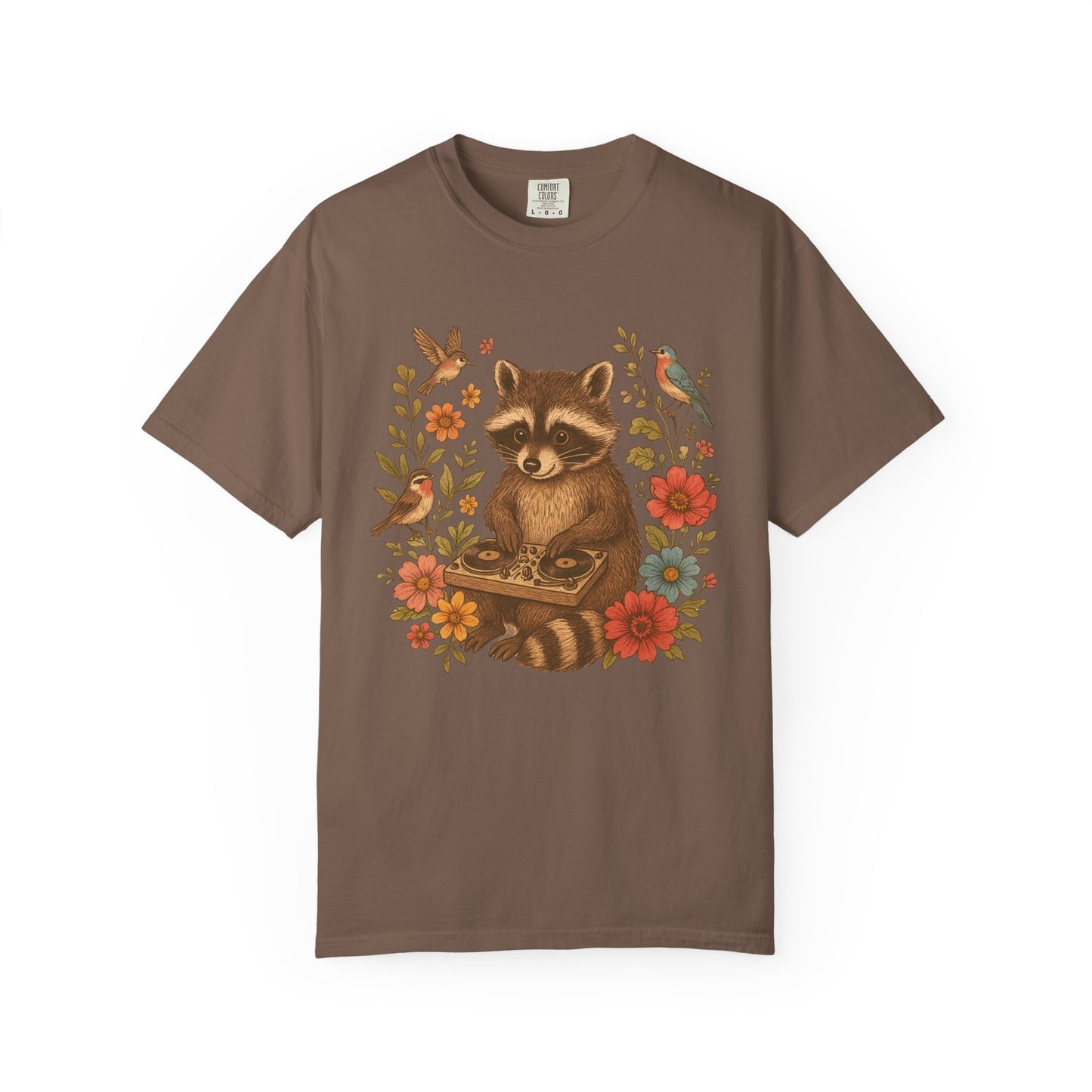 T-shirt with vintage raccoon DJ design surrounded by coral flowers, yellow blooms, and songbirds