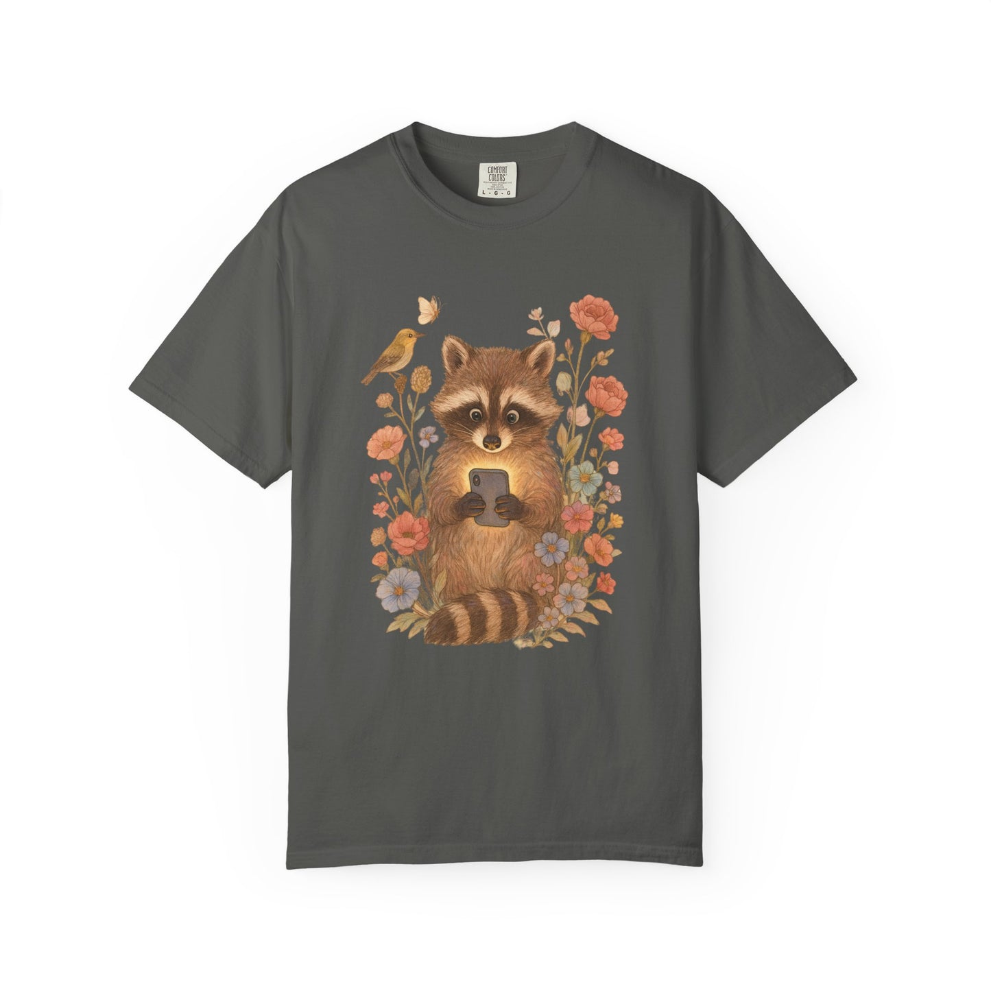 T-shirt with cute raccoon holding smartphone surrounded by coral and blue wildflowers