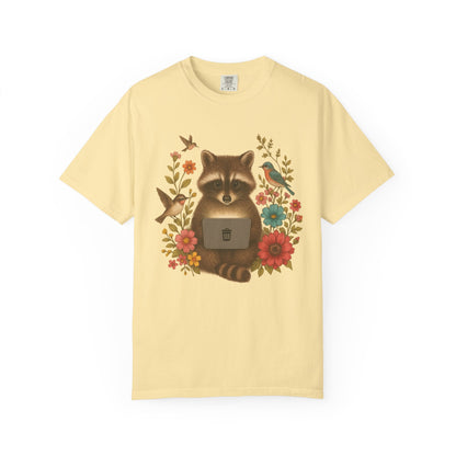 T-shirt with vintage-style raccoon illustration surrounded by colorful wildflowers and birds