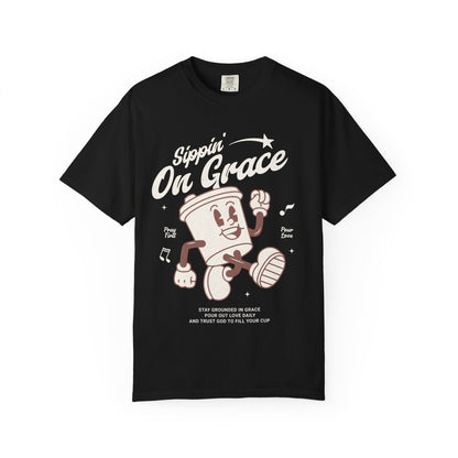 Christian t-shirt with cartoon coffee cup character and 'Sippin' On Grace' text in brown design