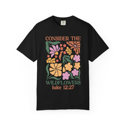 T-shirt with colorful wildflower design and 'Consider the Wildflowers Luke 12:27' bible verse text