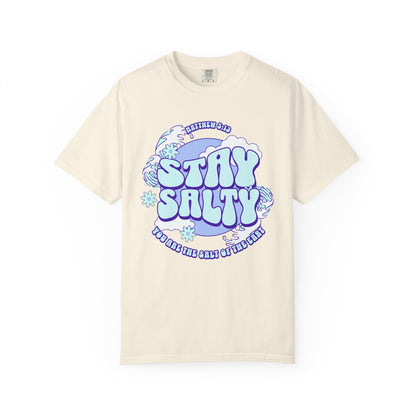T-shirt with purple and mint green 'Stay Salty' text design featuring Matthew 5:13 scripture and retro styling