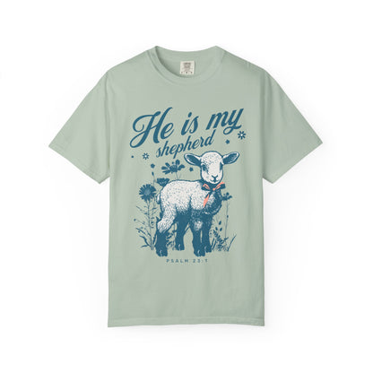Christian t-shirt featuring adorable lamb with wildflowers and 'He Is My Shepherd' text in teal