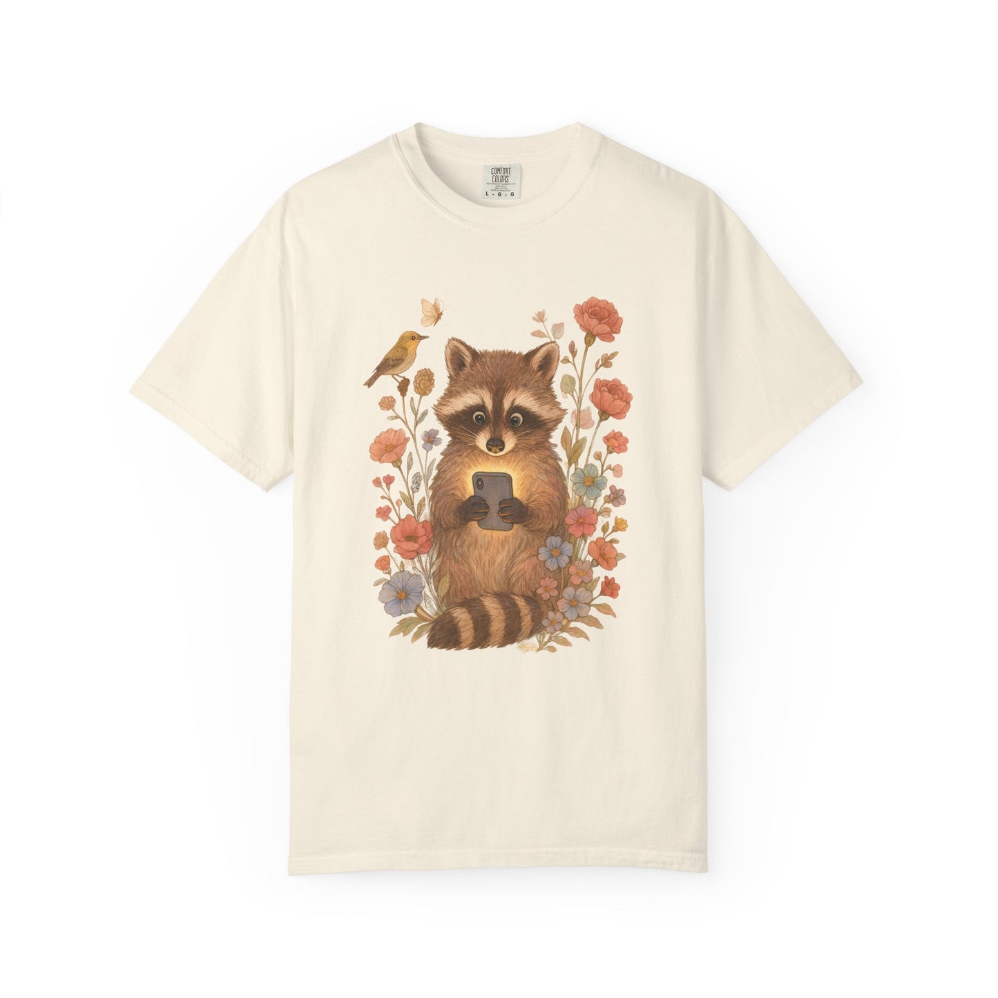 T-shirt with cute raccoon holding smartphone surrounded by coral and blue wildflowers