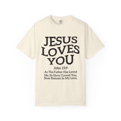 Black text design on t-shirt reading Jesus Loves You with John 15:9 Bible verse