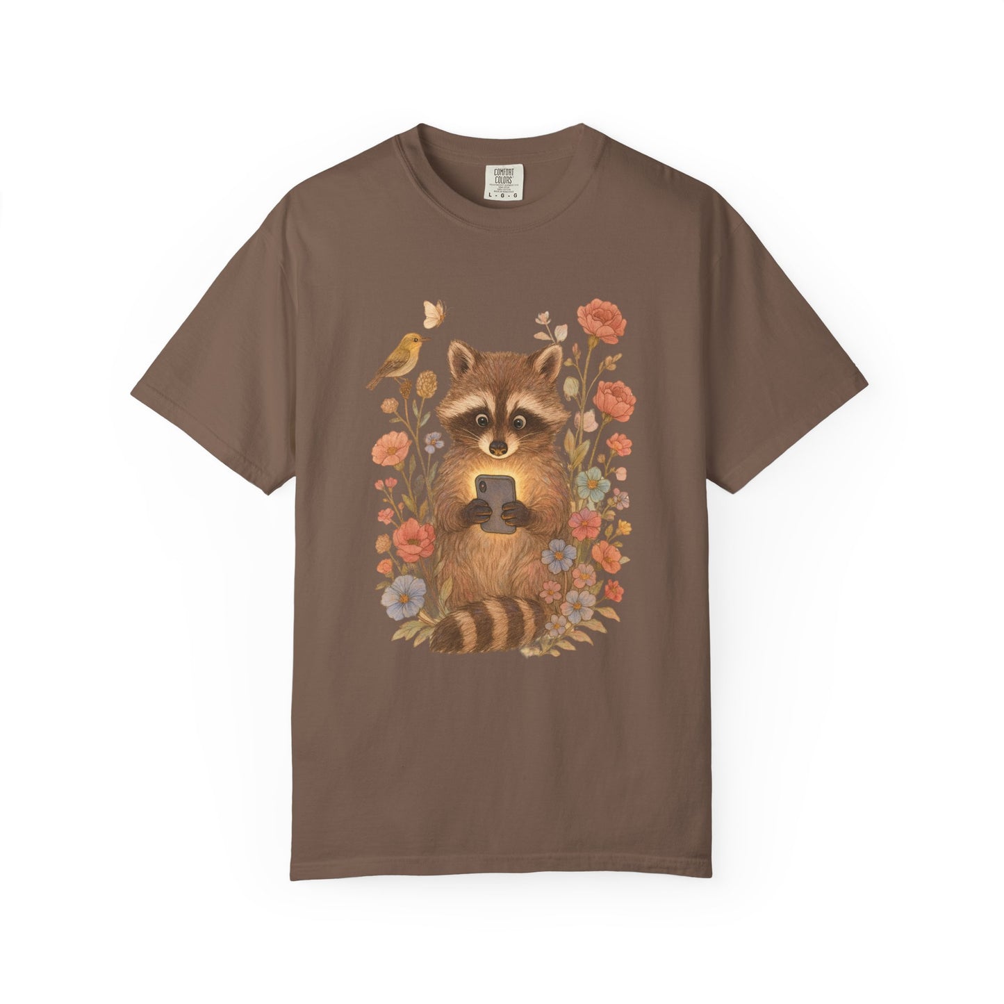 T-shirt with cute raccoon holding smartphone surrounded by coral and blue wildflowers