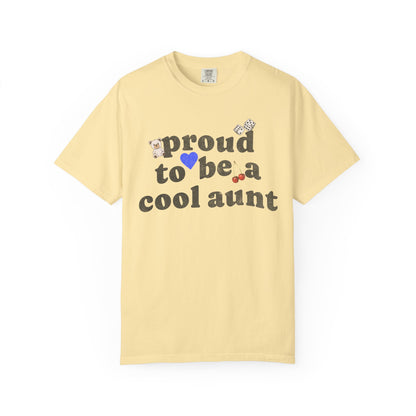 T-shirt with retro distressed text 'proud to be a cool aunt' decorated with teddy bear, blue heart, dice, and cherries