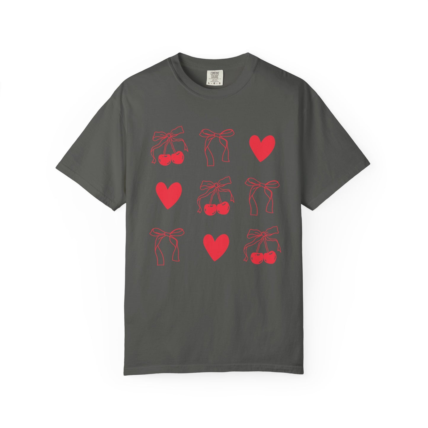 T-shirt with red cherry and bow pattern featuring hearts and ribbon bow designs