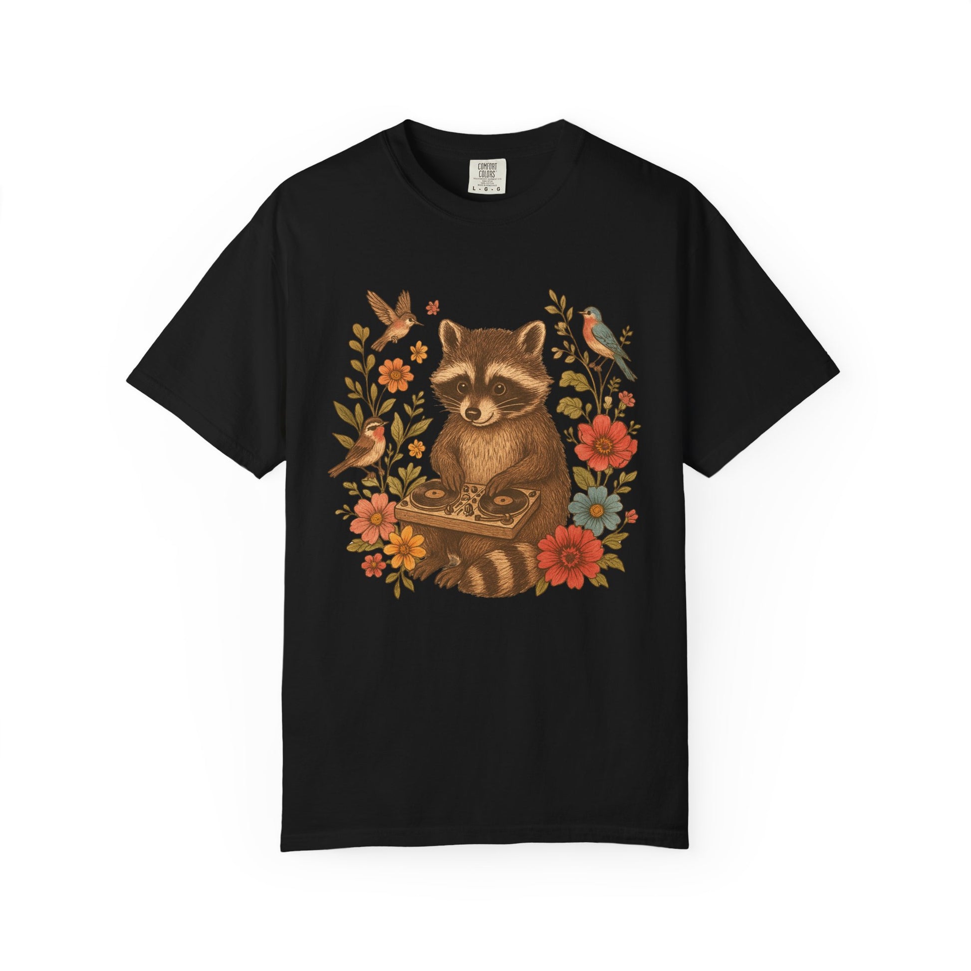 T-shirt with vintage raccoon DJ design surrounded by coral flowers, yellow blooms, and songbirds
