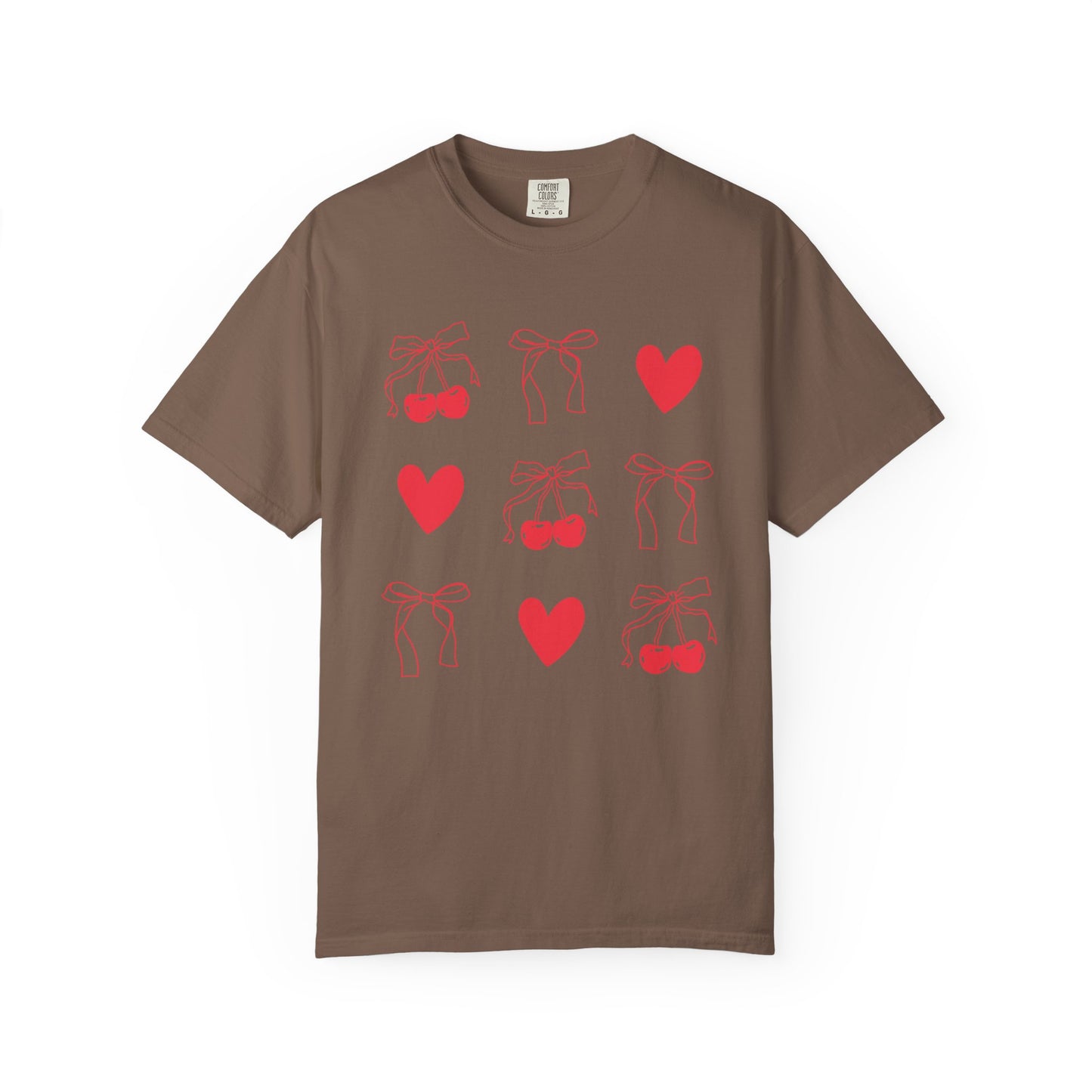 T-shirt with red cherry and bow pattern featuring hearts and ribbon bow designs