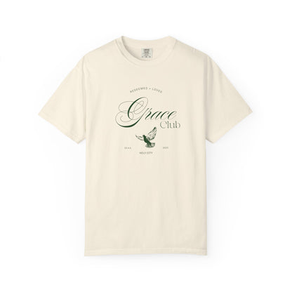 T-shirt with Grace Club text, dove symbol, and Redeemed + Loved message in elegant green design