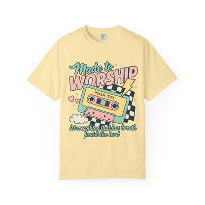 T-shirt with retro cassette tape design featuring 'Made to Worship' text and Psalm 150:6 scripture in pastel colors
