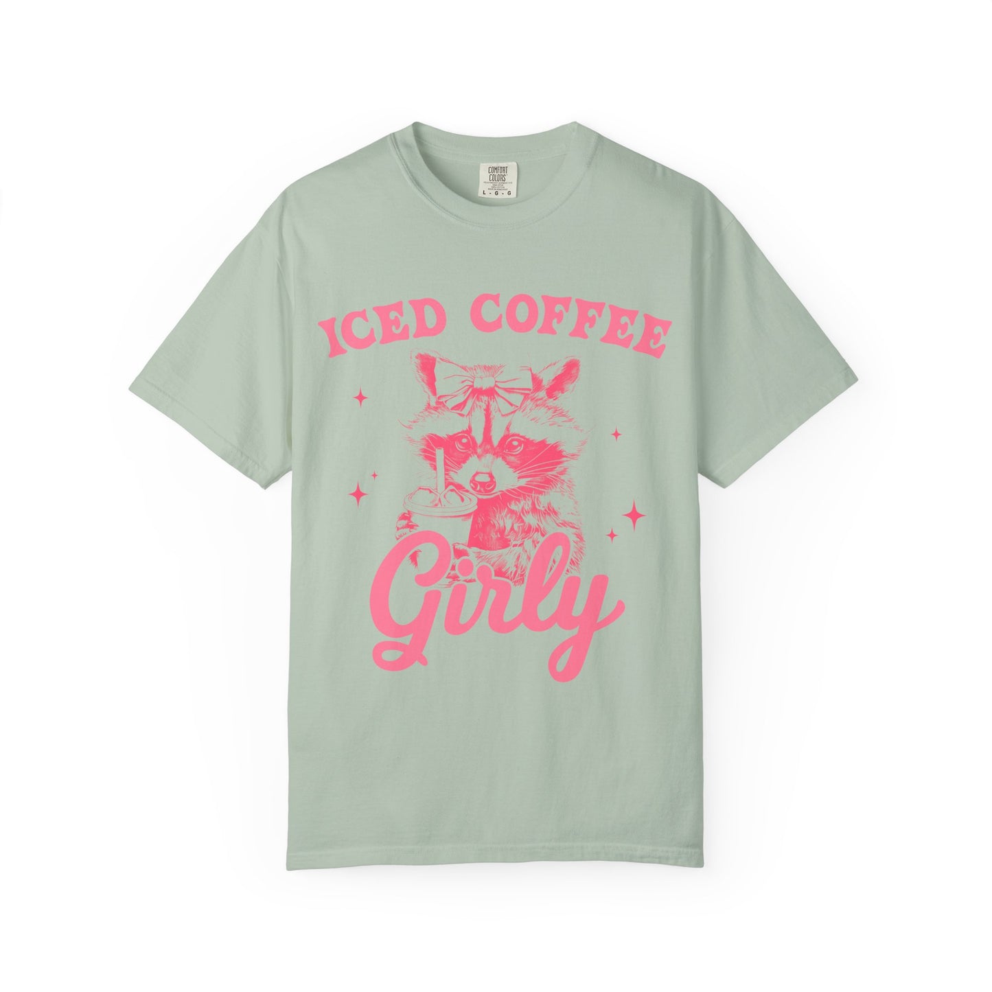 T-shirt with pink raccoon wearing bow holding iced coffee cup with 'Iced Coffee Girl' text and stars