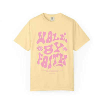 T-shirt with pink wavy font saying Walk By Faith with flowers and John 20:29 Bible verse