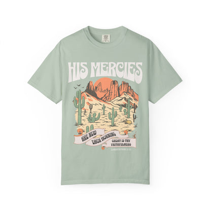 Christian t-shirt with desert landscape design featuring 'His Mercies Are New Each Morning' text and Lamentations 3:23 verse