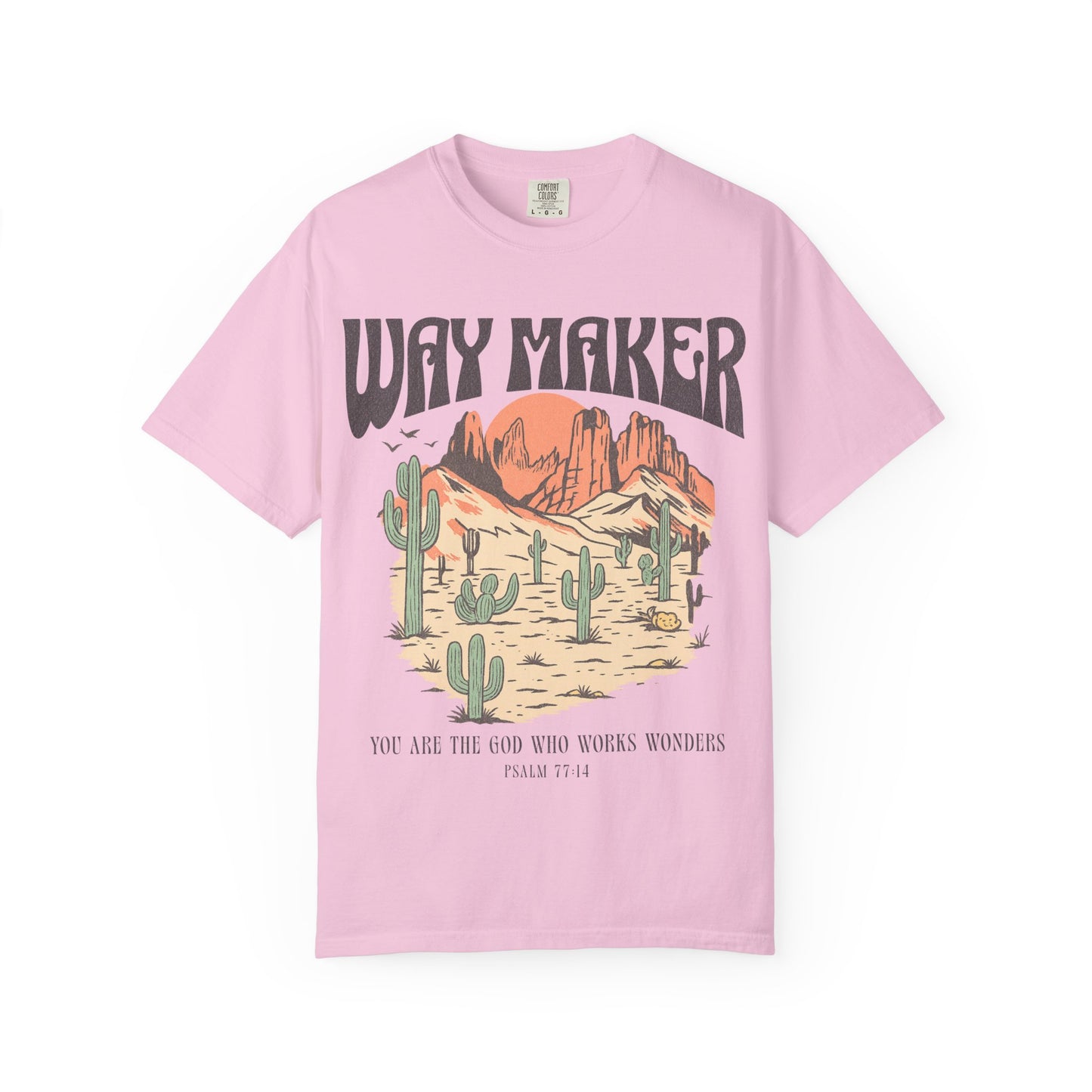 T-shirt with Way Maker text, desert landscape featuring cacti, mountains, and orange sunset with Psalm 77:14 verse