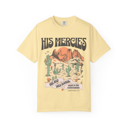 Christian t-shirt with desert landscape design featuring 'His Mercies Are New Each Morning' text and Lamentations 3:23 verse
