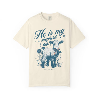 Christian t-shirt featuring adorable lamb with wildflowers and 'He Is My Shepherd' text in teal