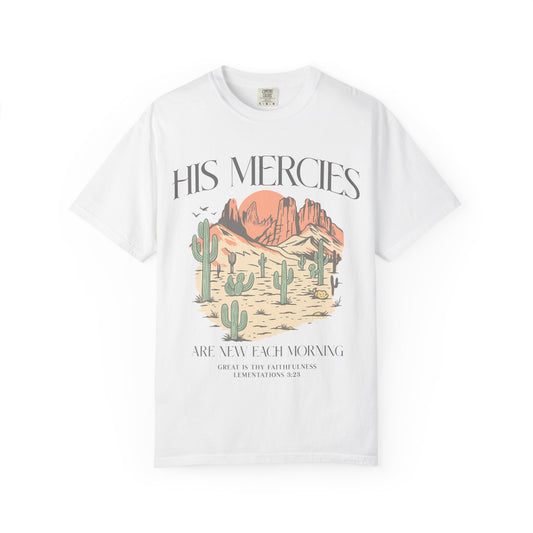 T-shirt with desert landscape design featuring cacti, mountains, and 'His Mercies Are New Each Morning' text with Lamentations 3:23 bible verse