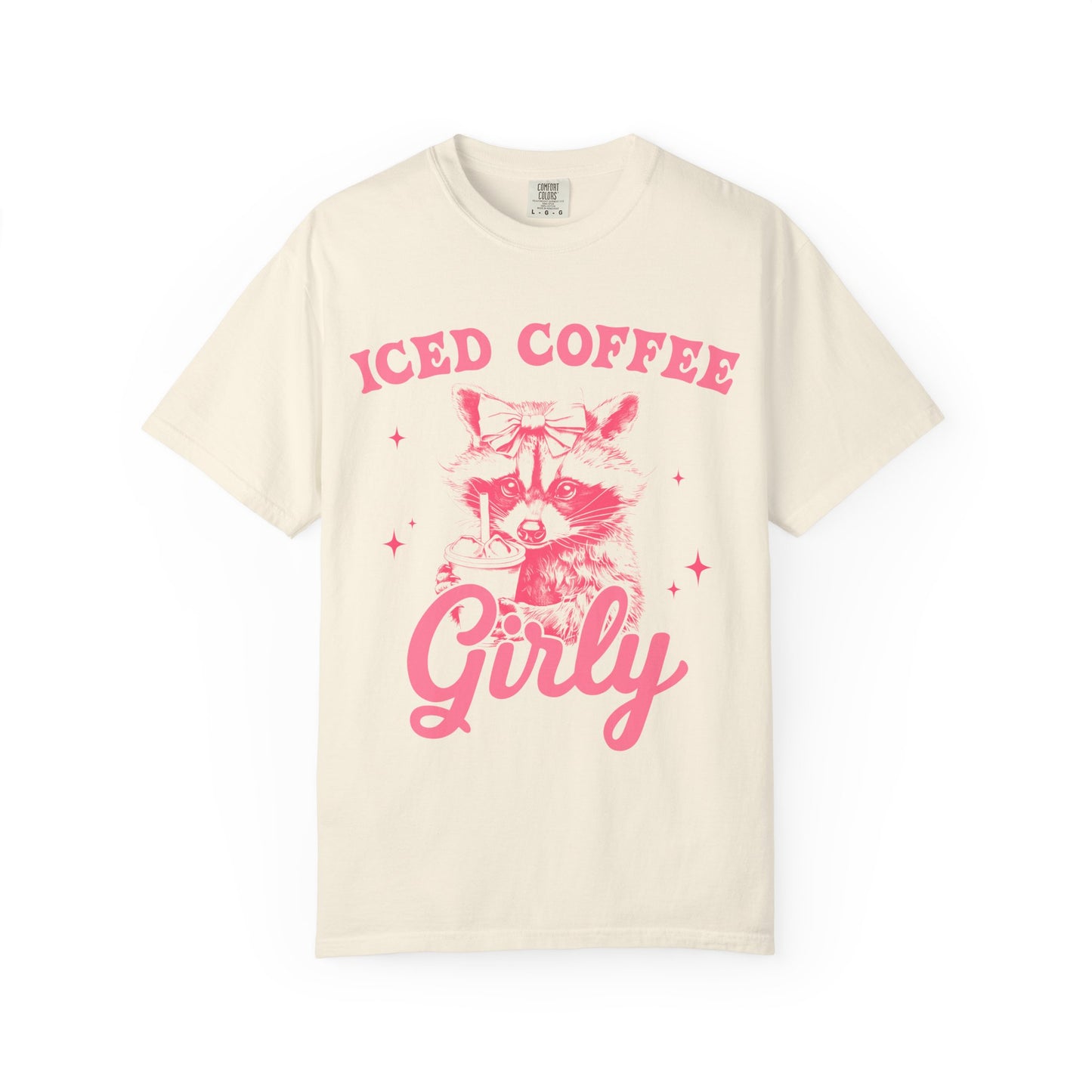 T-shirt with pink raccoon wearing bow holding iced coffee cup with 'Iced Coffee Girl' text and stars
