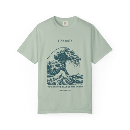 T-shirt with ocean wave design featuring Stay Salty text and Matthew 5:13 Bible verse
