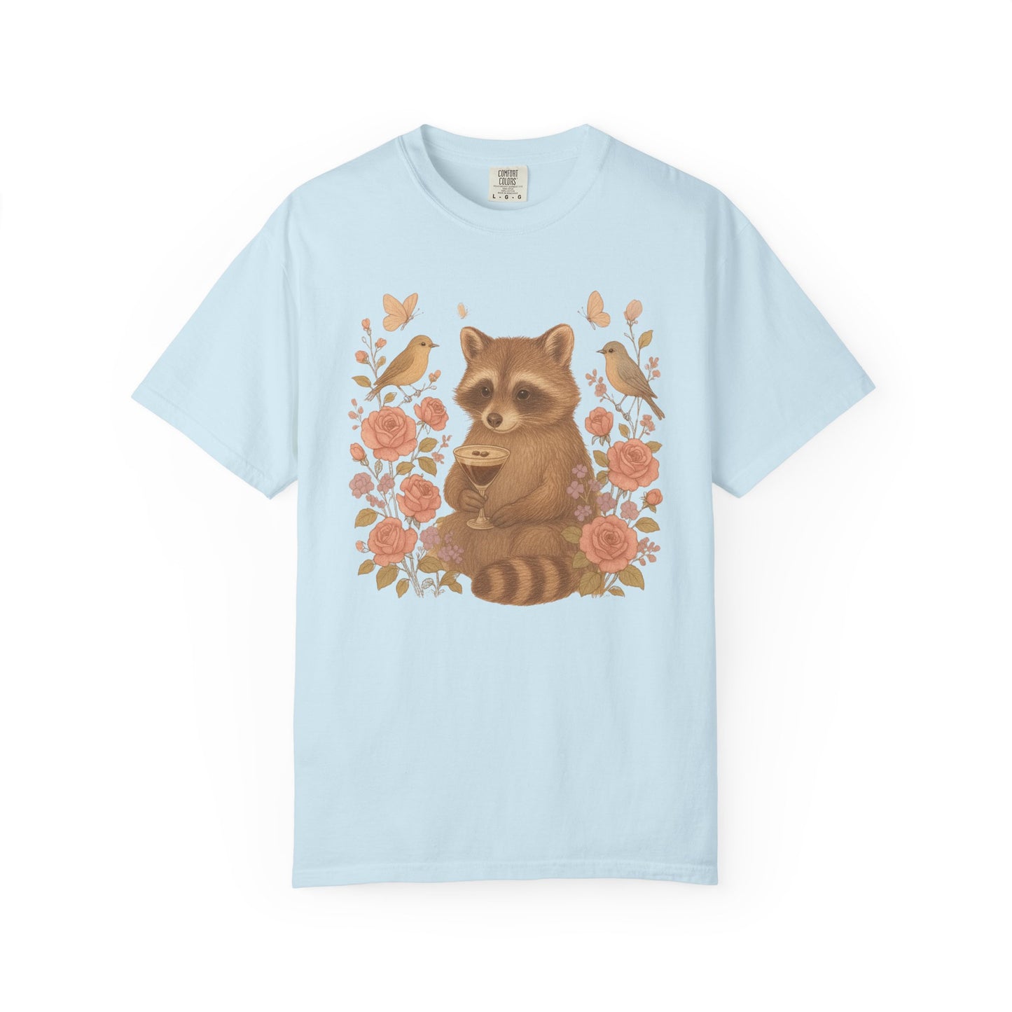 T-shirt with raccoon holding espresso martini glass surrounded by pink roses and birds