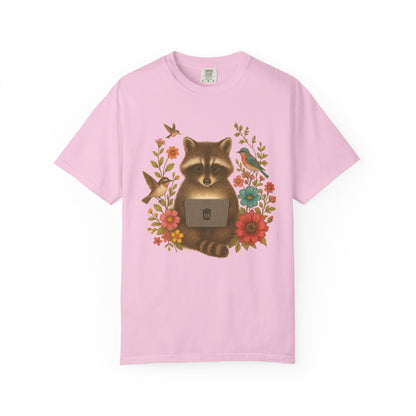 T-shirt with vintage-style raccoon illustration surrounded by colorful wildflowers and birds