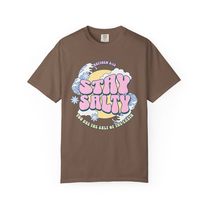 Christian t-shirt with pink 'Stay Salty' text, Matthew 5:13 verse, ocean waves and daisy flowers