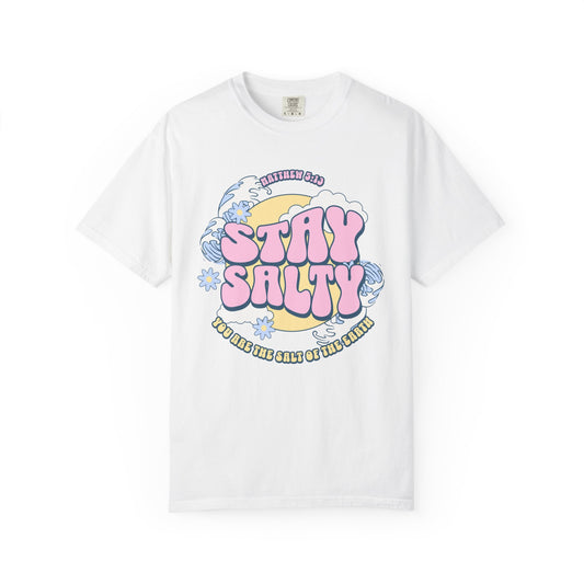 Christian t-shirt with pink 'Stay Salty' text, Matthew 5:13 verse, ocean waves and daisy flowers