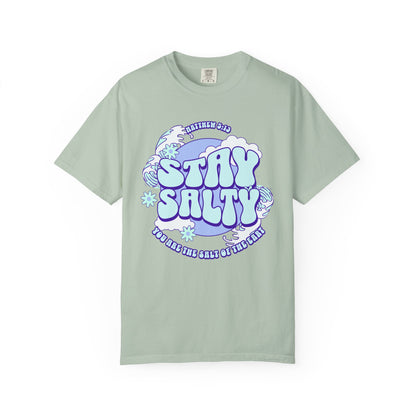 T-shirt with purple and mint green 'Stay Salty' text design featuring Matthew 5:13 scripture and retro styling