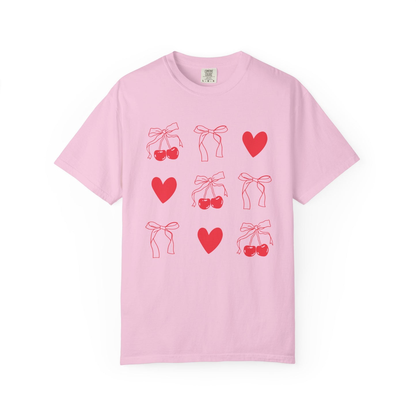 T-shirt with red cherry and bow pattern featuring hearts and ribbon bow designs