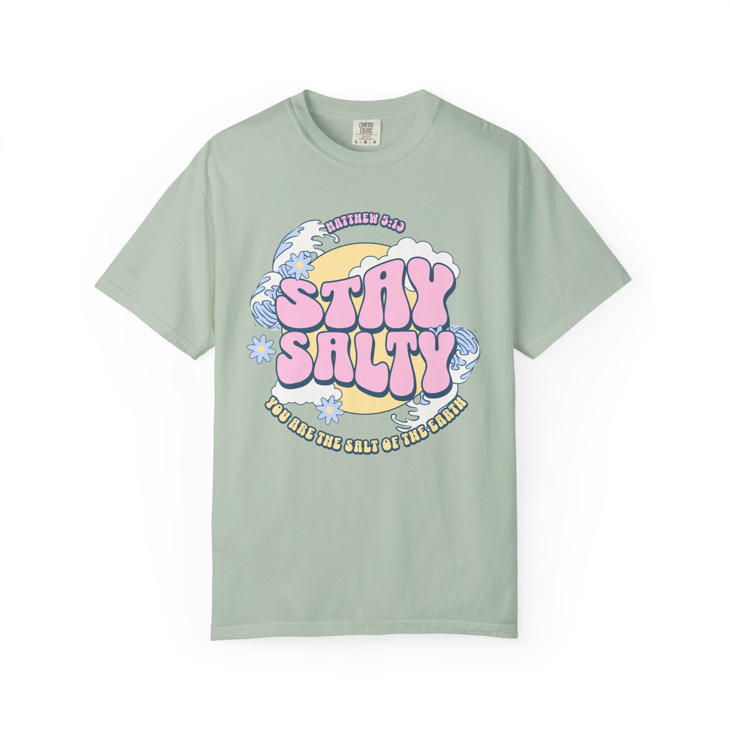 Christian t-shirt with pink 'Stay Salty' text, Matthew 5:13 verse, ocean waves and daisy flowers