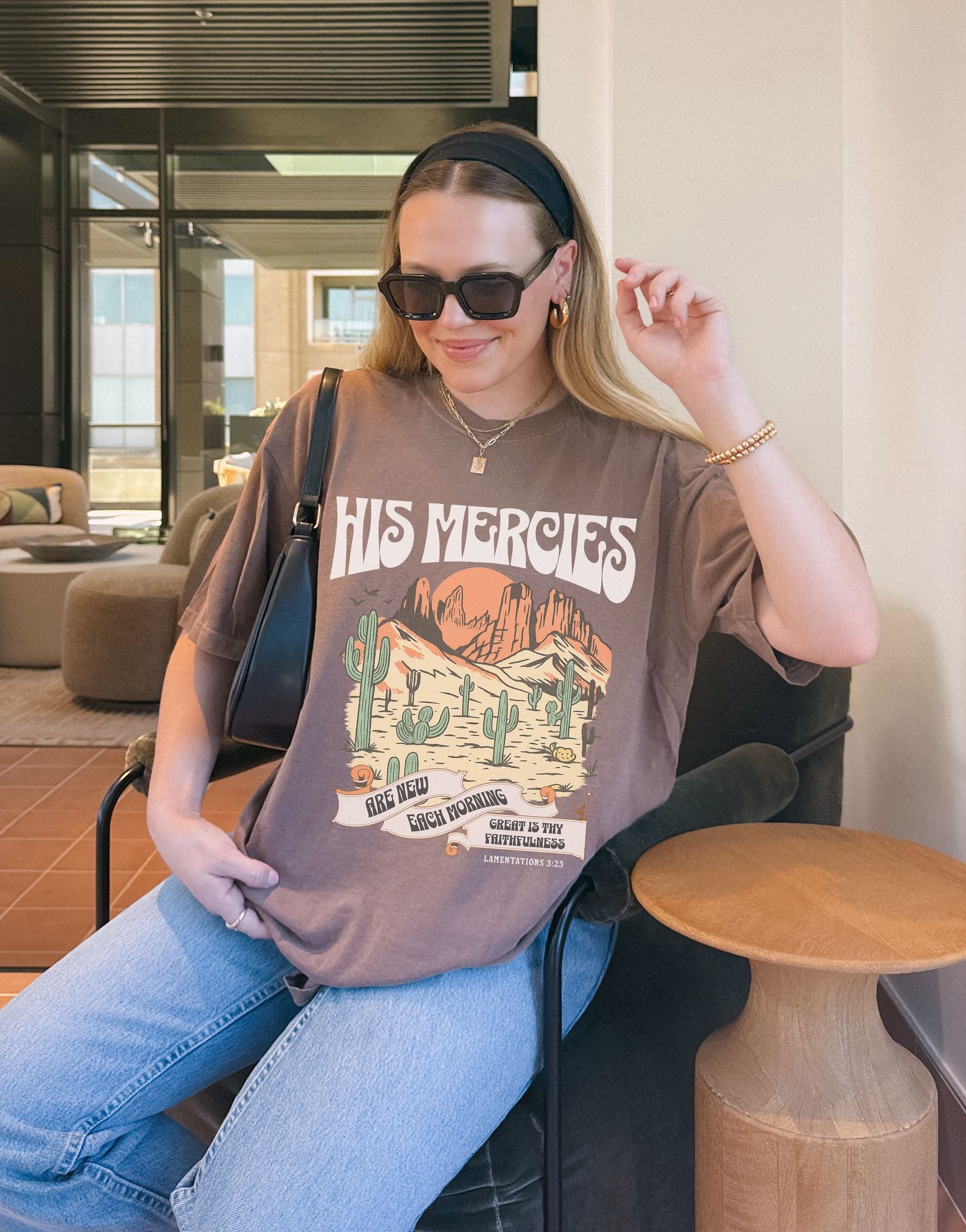Christian t-shirt with desert landscape design featuring 'His Mercies Are New Each Morning' text and Lamentations 3:23 verse