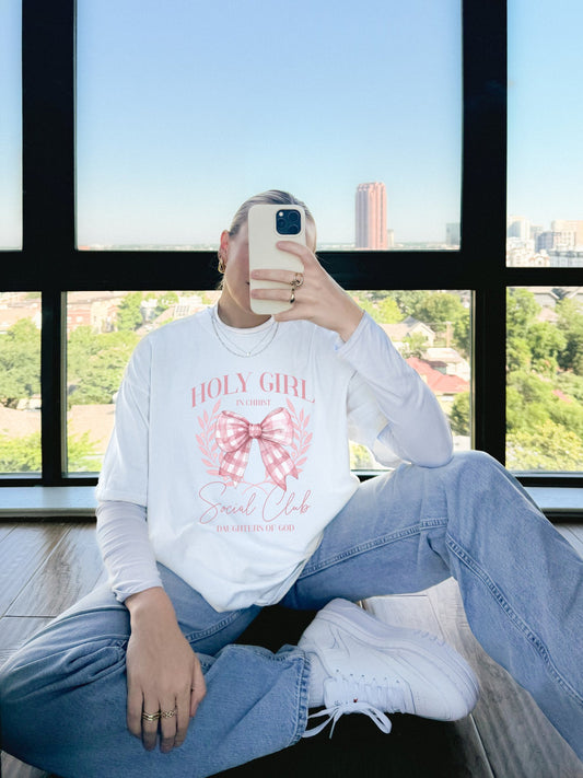 Tshirt with Holy Girl Social Club design featuring pink gingham bow and floral elements