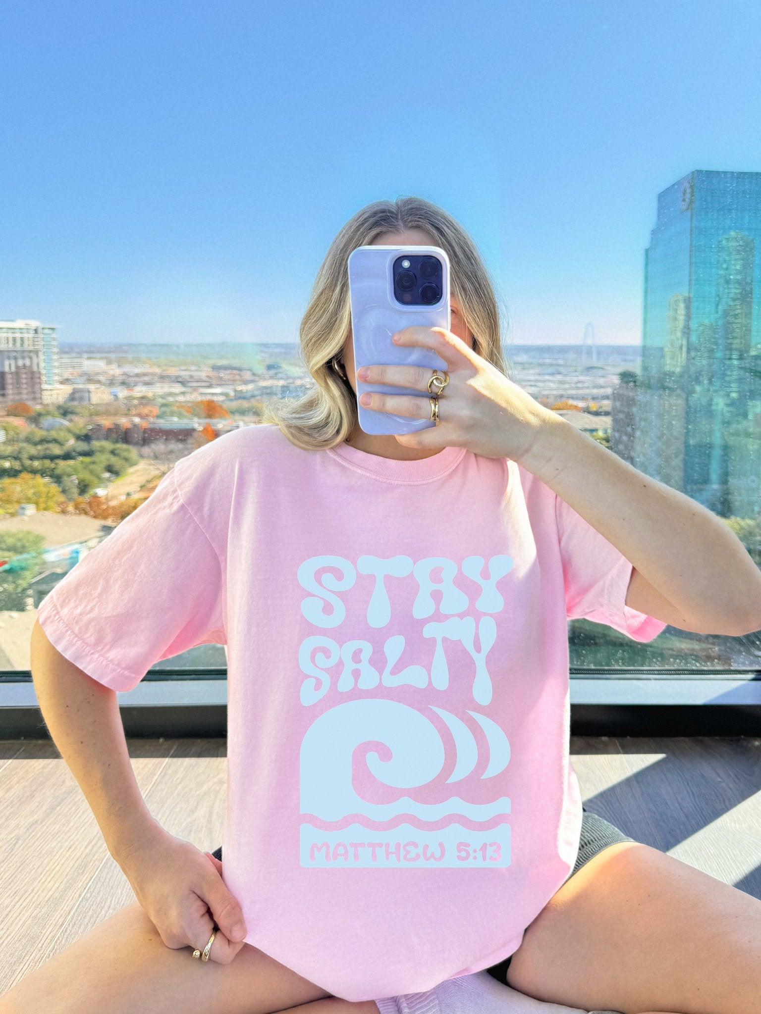 Christian t-shirt with 'Stay Salty' text and ocean wave design referencing Matthew 5:13