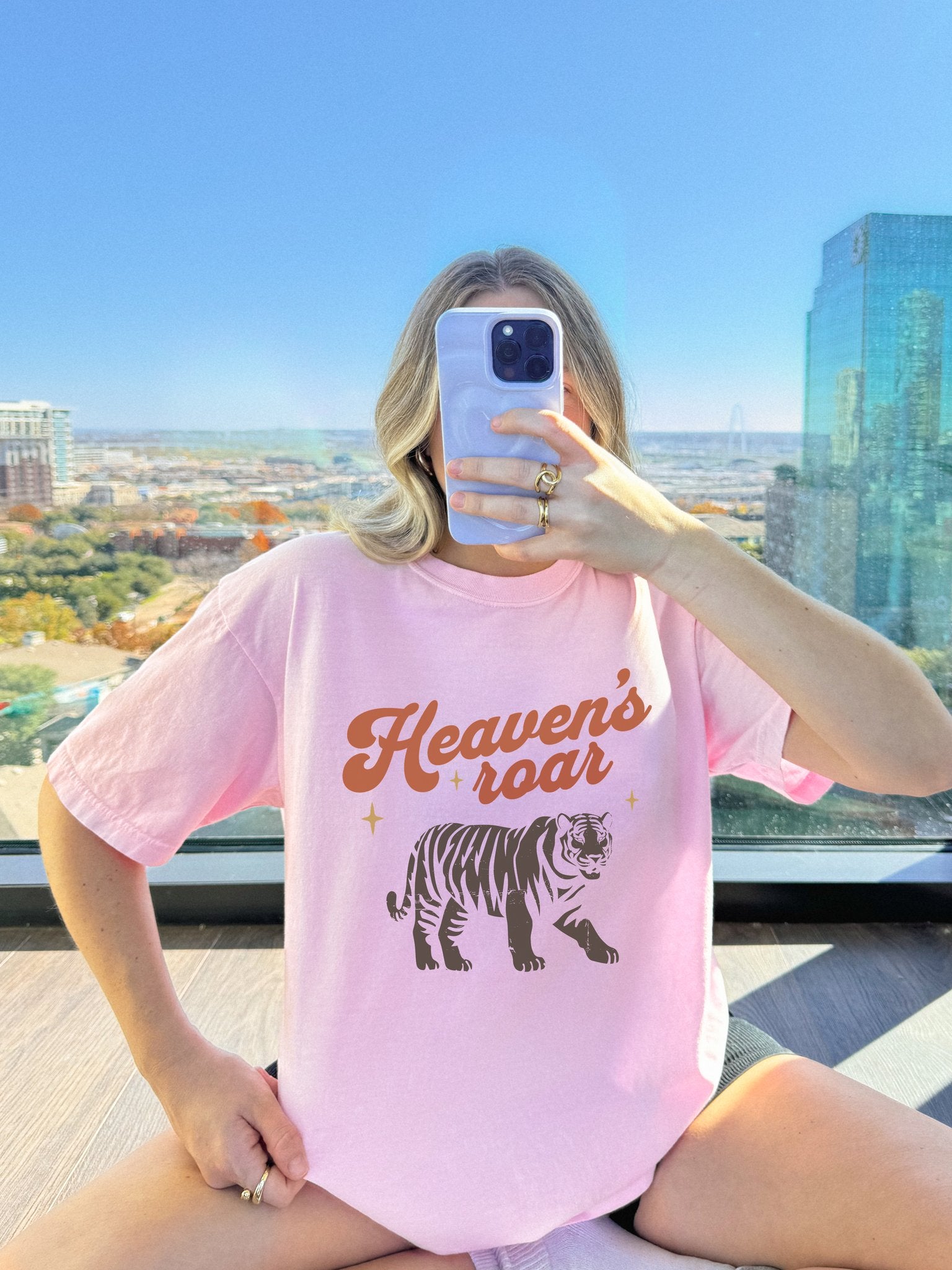 Christian t-shirt with Heaven's roar text in orange retro font and tiger graphic with stars