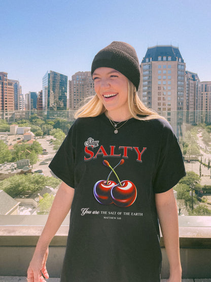 T-shirt with retro Stay Salty text and vintage cherry design featuring Matthew 5:13 scripture