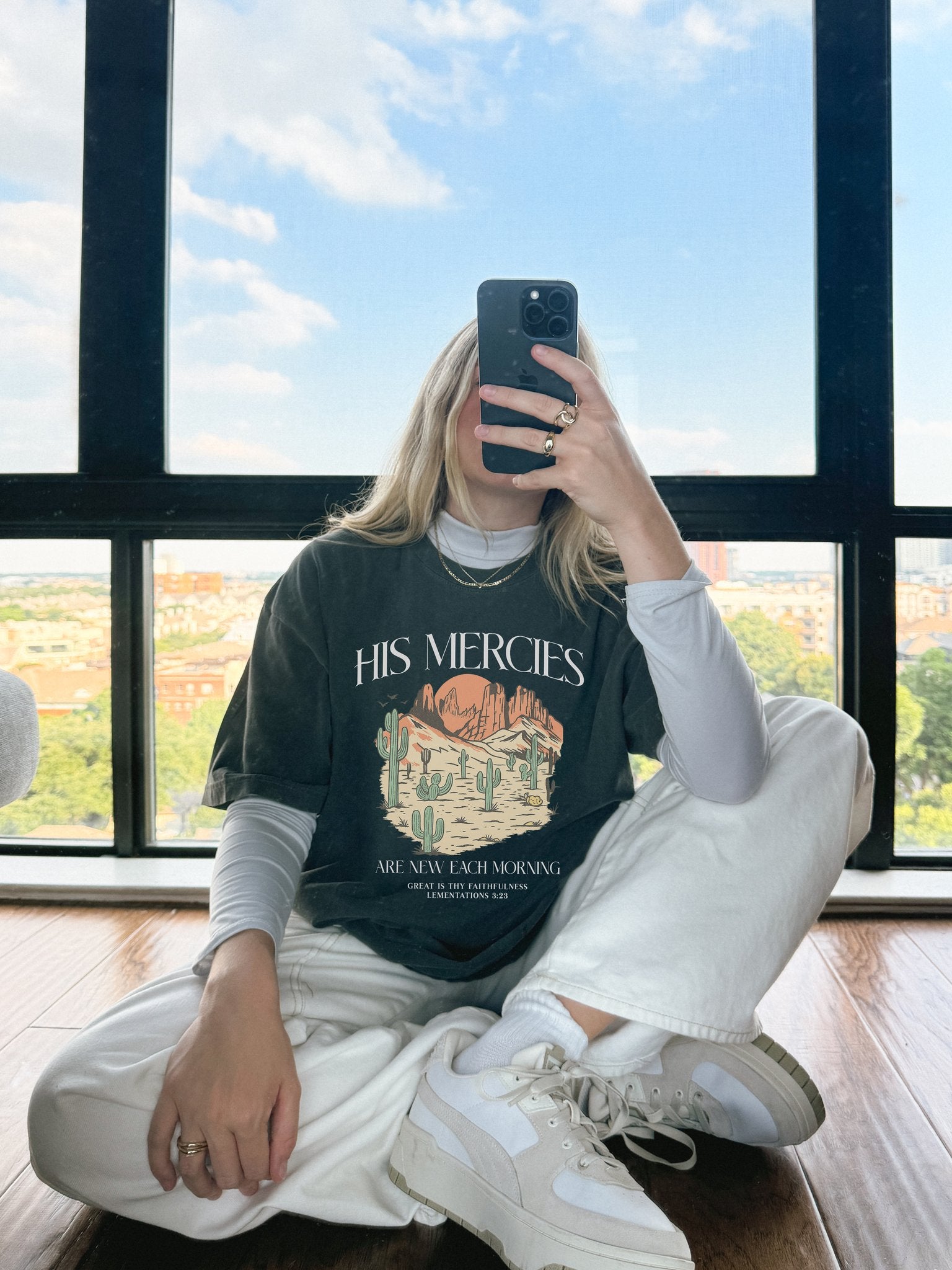 T-shirt with desert landscape design featuring cacti, mountains, and 'His Mercies Are New Each Morning' text with Lamentations 3:23 bible verse