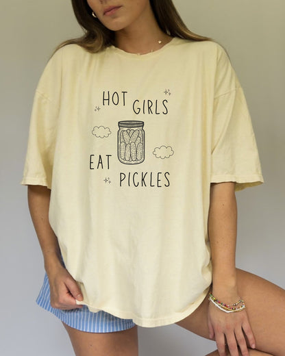 T-shirt with hand-lettered 'Hot Girls Eat Pickles' text and illustrated pickle jar with clouds