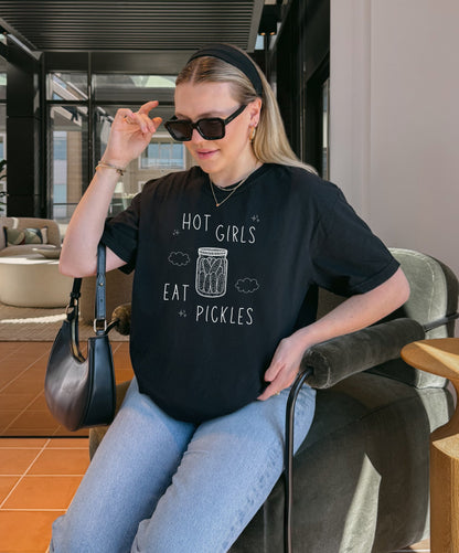 T-shirt with hand-lettered 'Hot Girls Eat Pickles' text and illustrated pickle jar with clouds